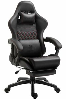 Black gaming chair with ergonomic design and footrest.